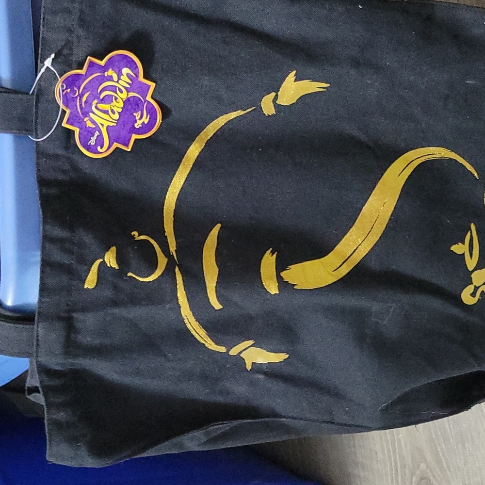 Disney Aladin keep sake( never used)